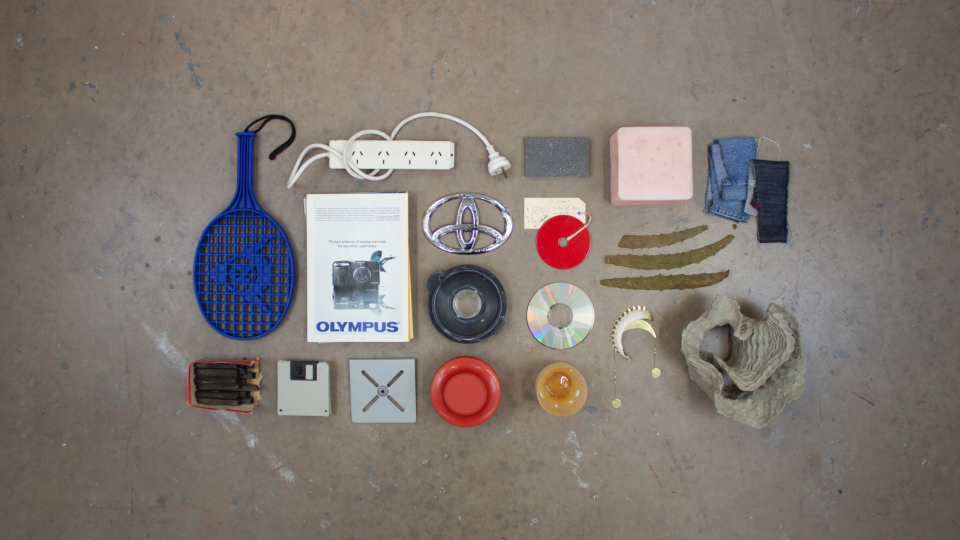 Flat-lay of HARD objects. Right hand objects are collected from participating artists, left hand objects are found.