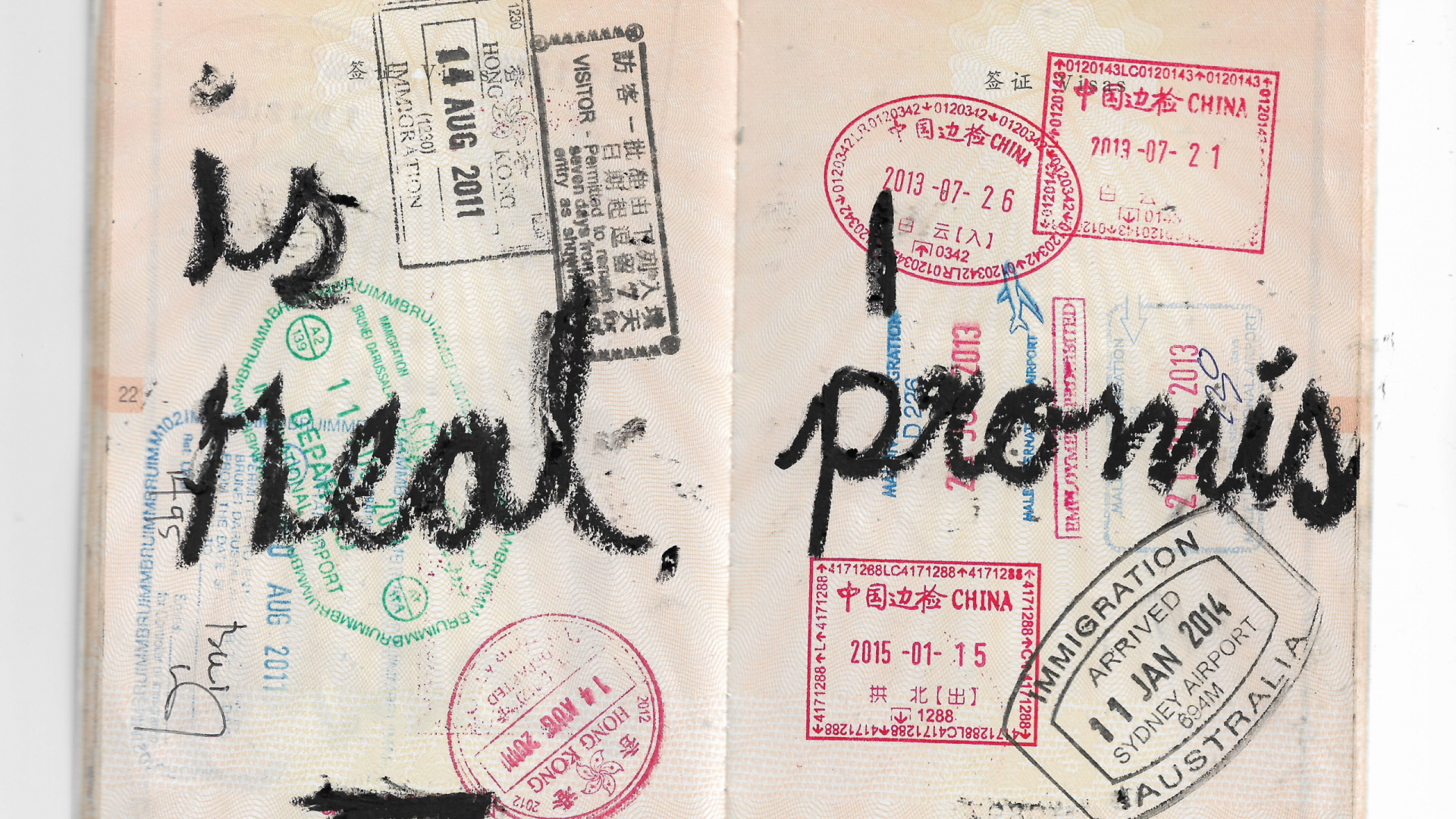 Photo of a passport intervened with the words Is real, I promise.